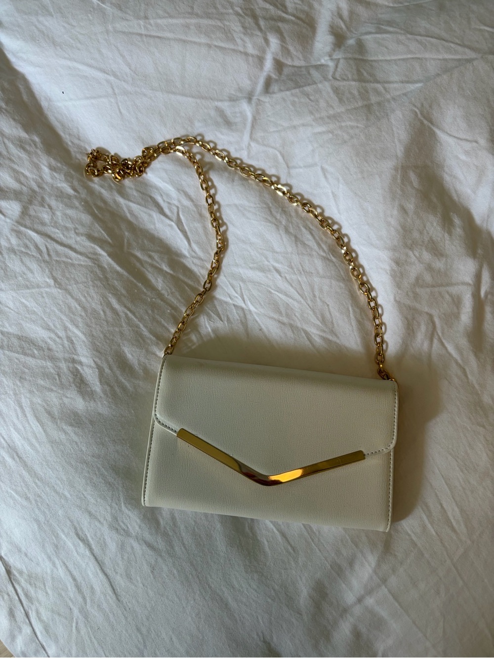 Amazon White Clutch with Gold Chain and Accent